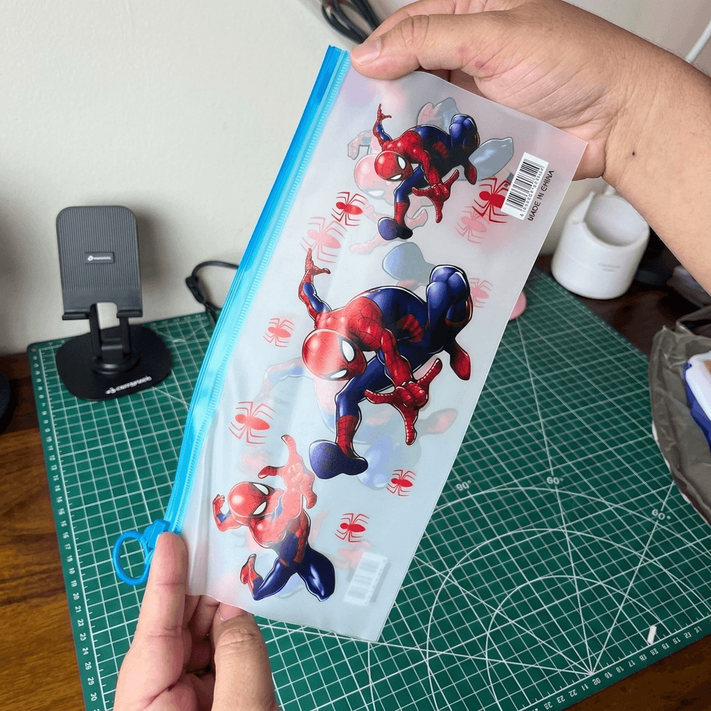 plastic Spider-Man cartoon pencil pouch with a blue zipper closure